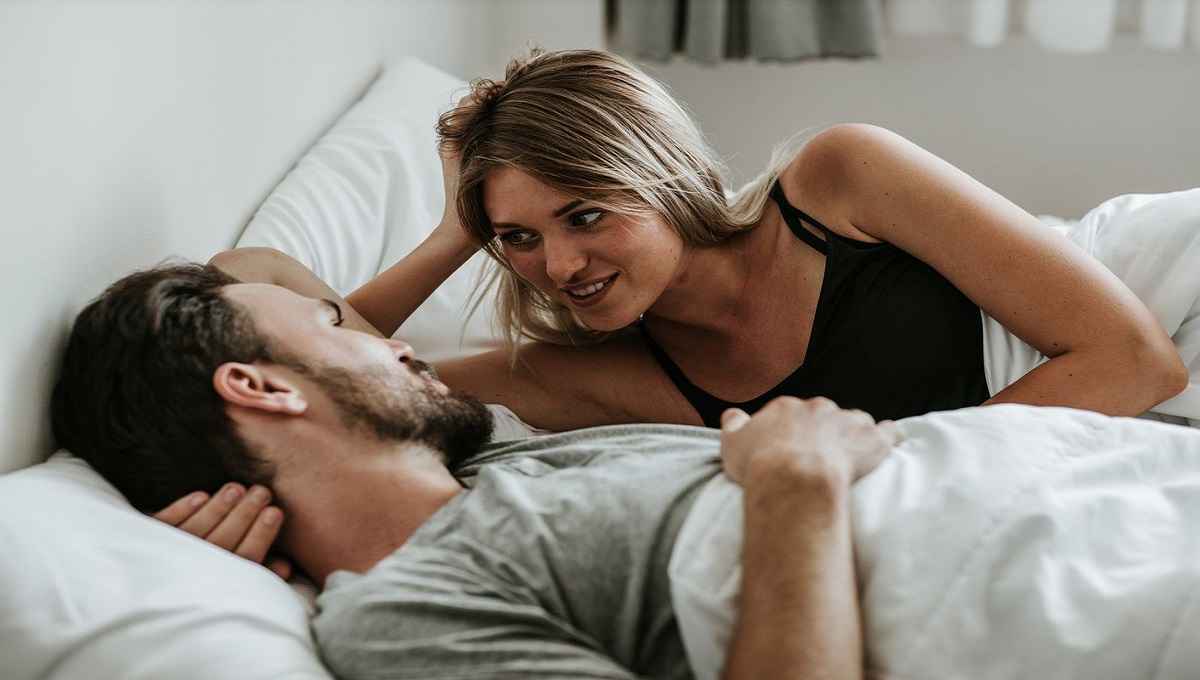 happy couple in love in the bed stock image royalty free image 1629213881