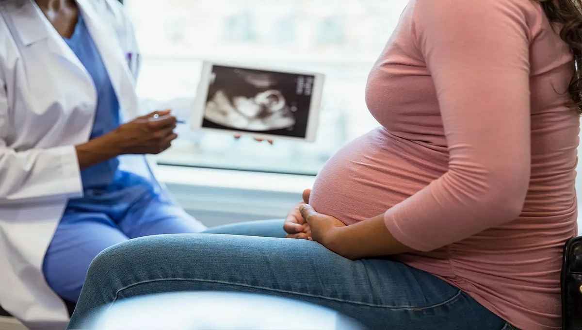 pregnant woman and doctor ultrasound 1334856826