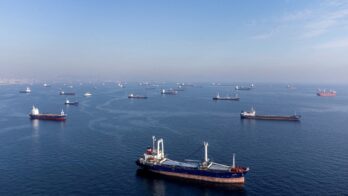 FILE PHOTO: FILE PHOTO: Commercial vessels including vessels which are part of Black Sea grain deal wait to pass the Bosphorus strait off the shores of Yenikapi in Istanbul