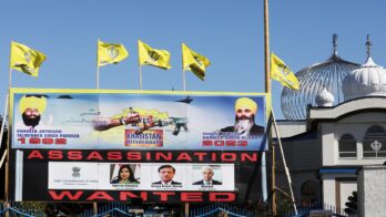 a sign outside the guru nanak sikh gurdwara temple is seen after the killing on its grounds in june 2023 of sikh leader hardeep singh nijjar, in surrey