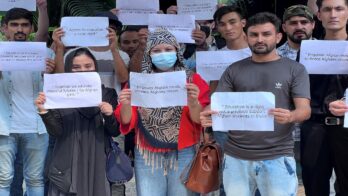 afghan students living in india hold placards during a protest demanding extension of their study visa and scholarships, in new delhi