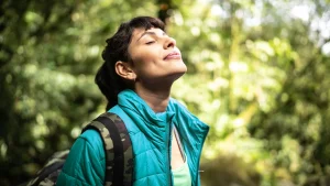 female eyes closed in woods 1296 728 header