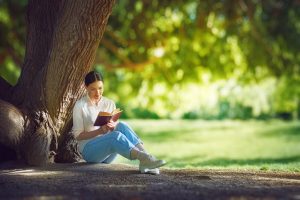 woman reading a book ppcelug 1024x684