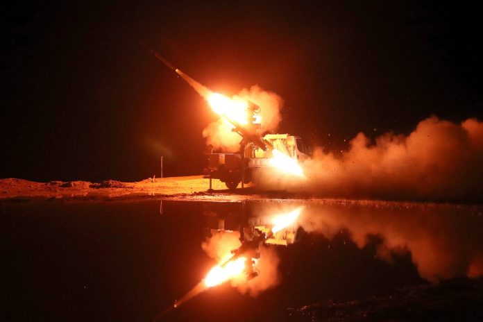 AFP 20221231 336B7CX v3 MidRes TopshotIranDefenceDrill 696x464 1